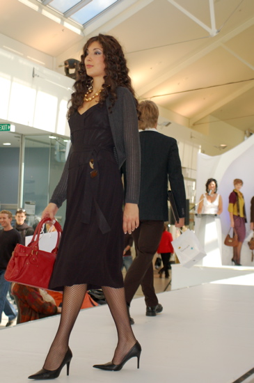 Black dress with berry-coloured bag