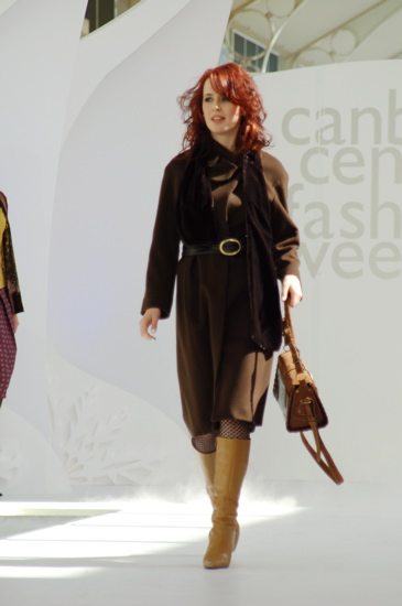 Long brown jacket with fawn boots
